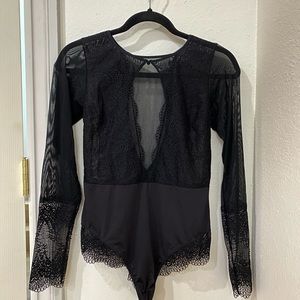 Super cute black laced body suit!